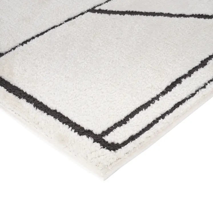 5' X 7' Ivory And Black Geometric Area Rug