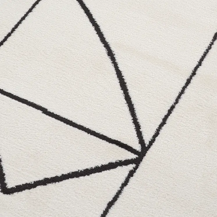 5' X 7' Ivory And Black Geometric Area Rug