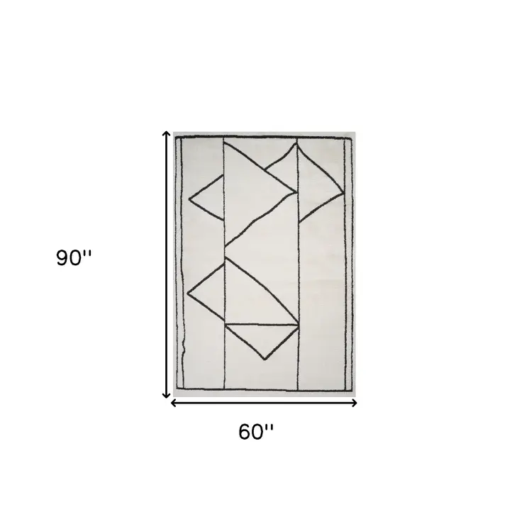 5' X 7' Ivory And Black Geometric Area Rug
