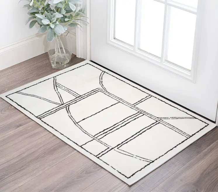2' X 3' Ivory And Black Geometric Area Rug