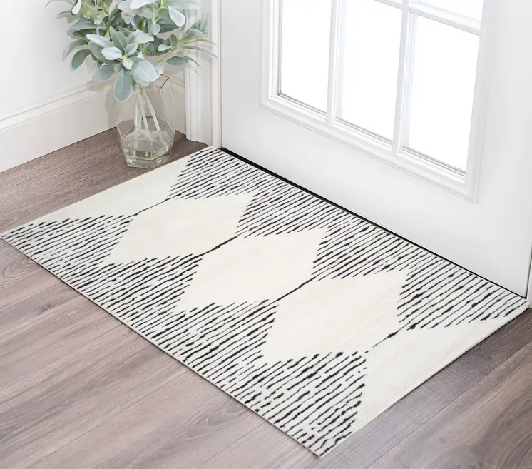 2' X 3' Ivory And Black Geometric Area Rug