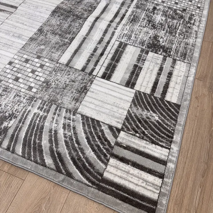 5' X 8' Gray Brown and Beige Abstract Area Rug