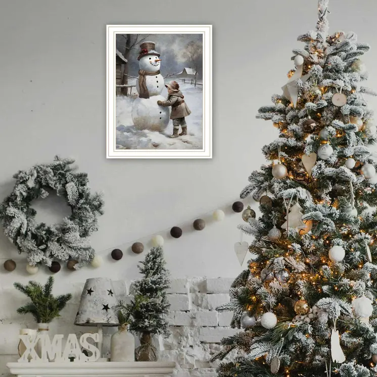 Boy Building A Snowman White Framed Wall Art