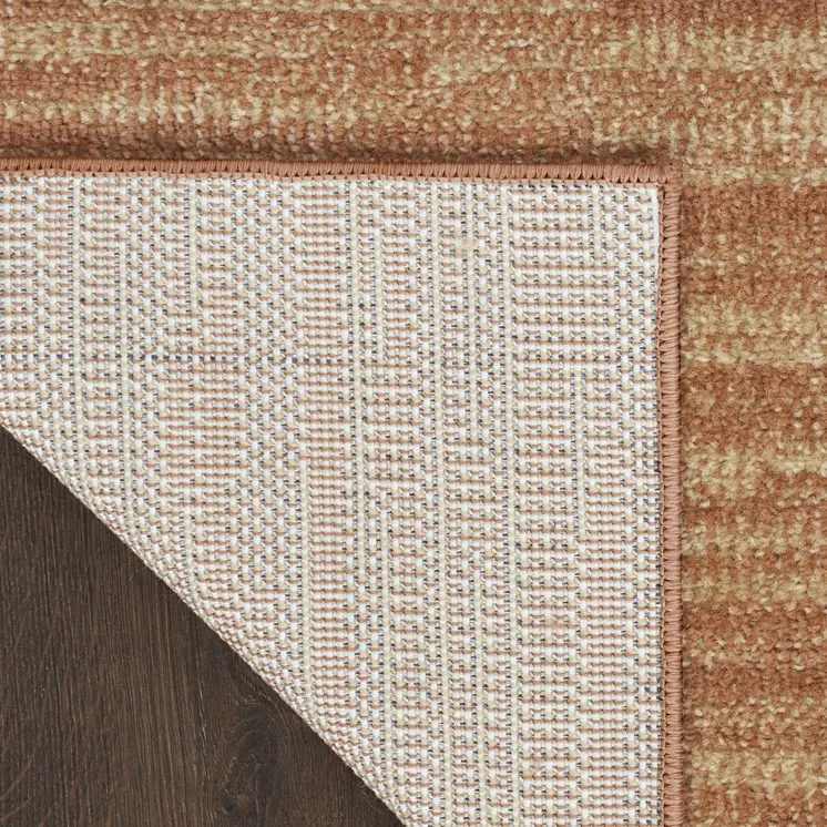 2' X 4' Rust And Beige Abstract Indoor Outdoor Area Rug