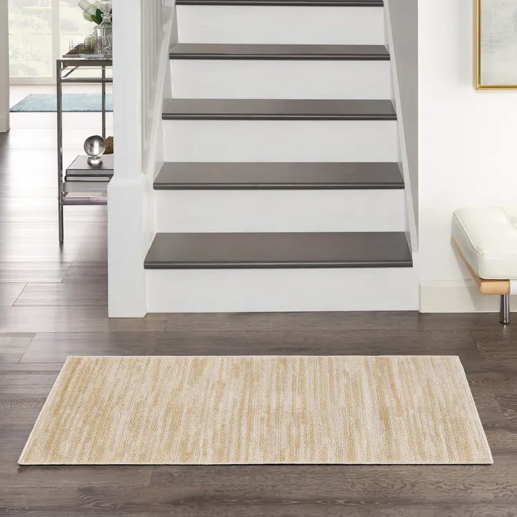 3' X 5' Ivory And Gold Abstract Indoor Outdoor Area Rug