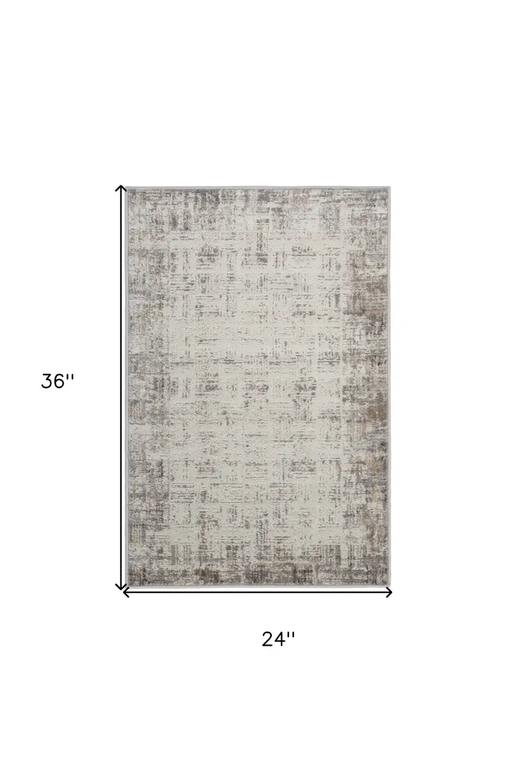2' X 3' Ivory and Gray Abstract Area Rug