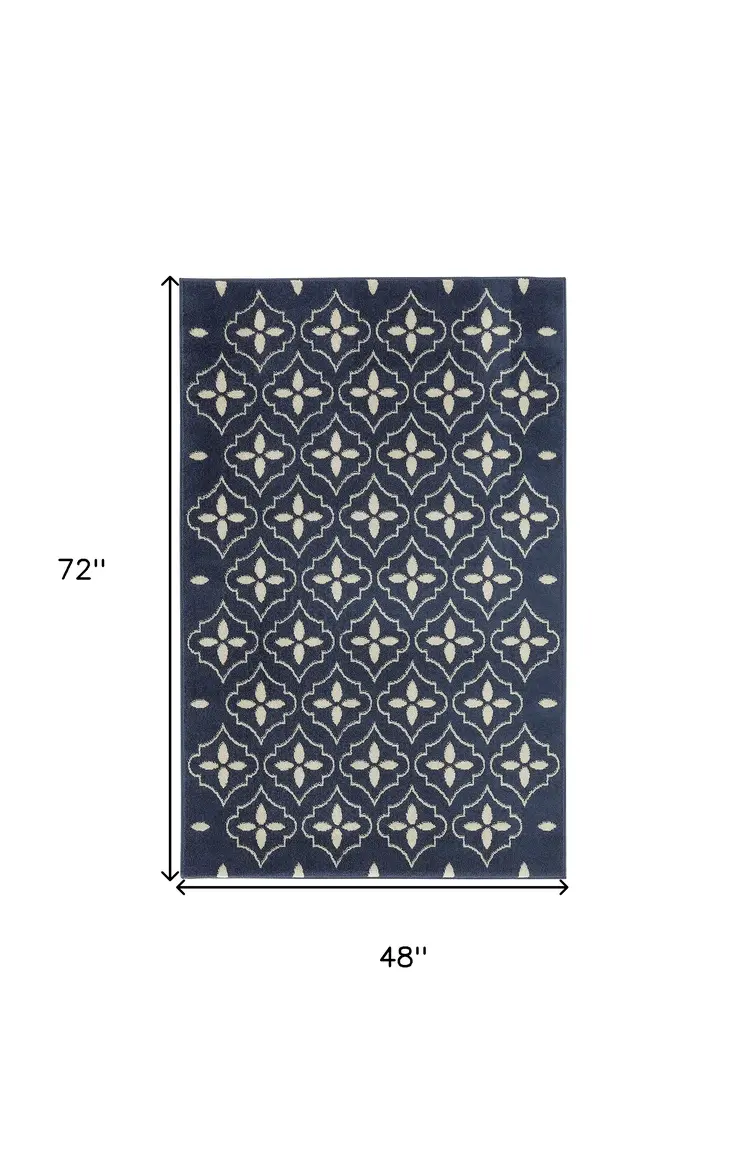 4' X 6' Navy Blue And Ivory Geometric Indoor Outdoor Area Rug