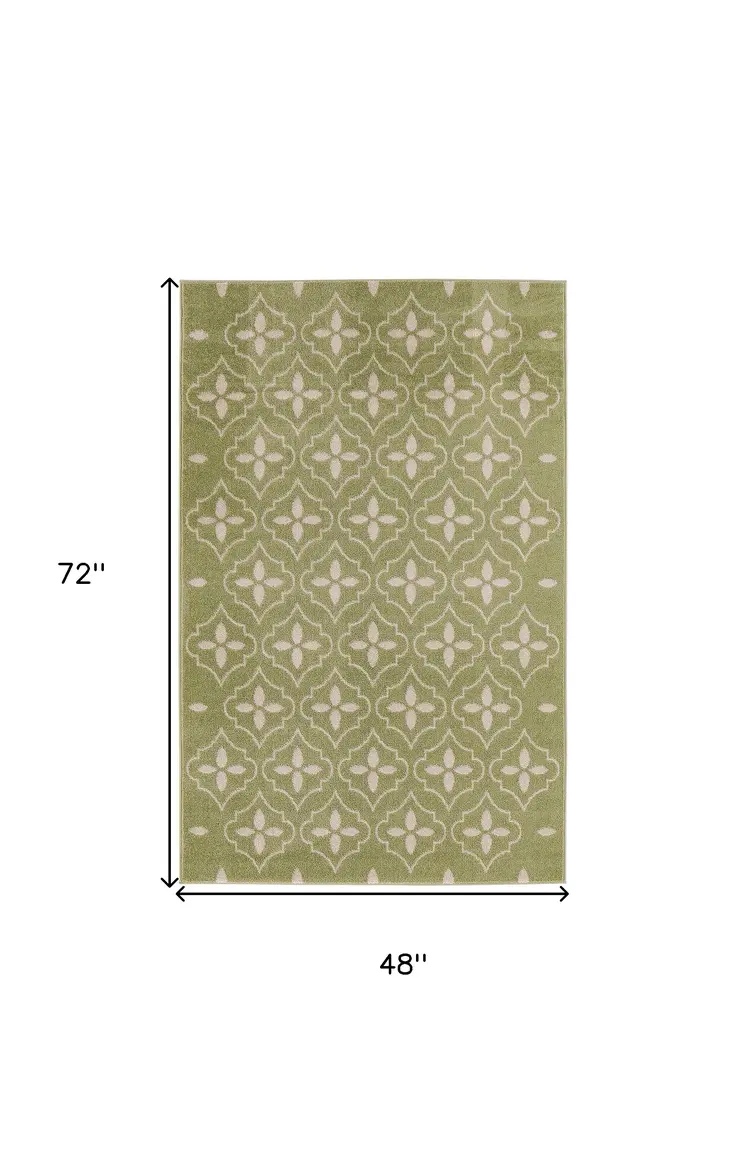 4' X 6' Green And Ivory Geometric Indoor Outdoor Area Rug