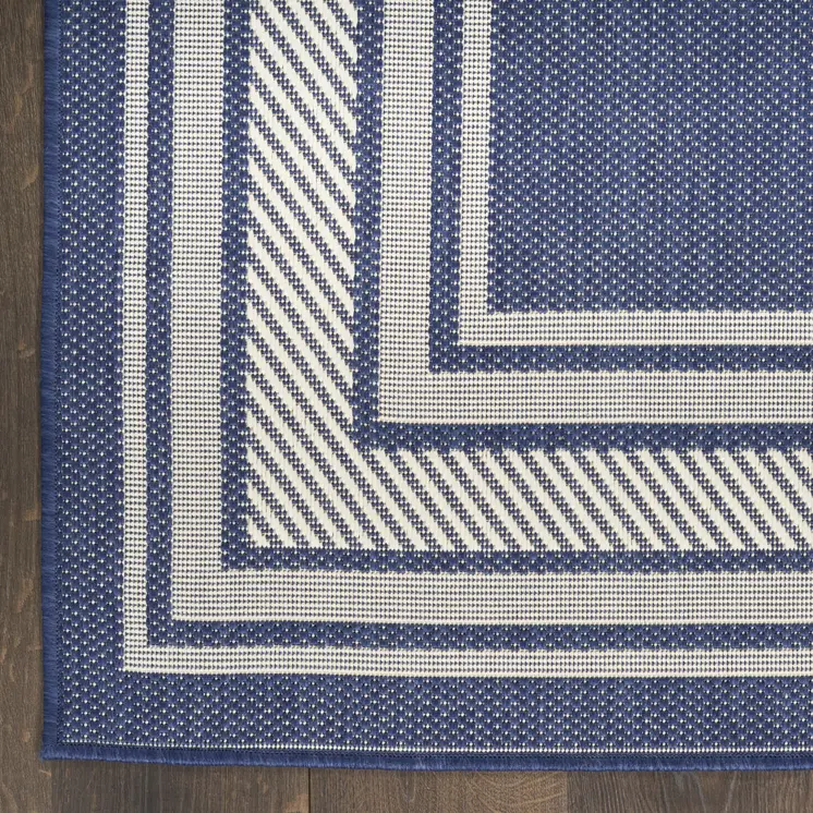 4' X 6' Navy Blue And Ivory Geometric Indoor Outdoor Area Rug