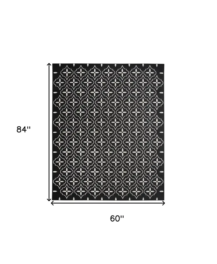 5' X 7' Black And Ivory Geometric Indoor Outdoor Area Rug