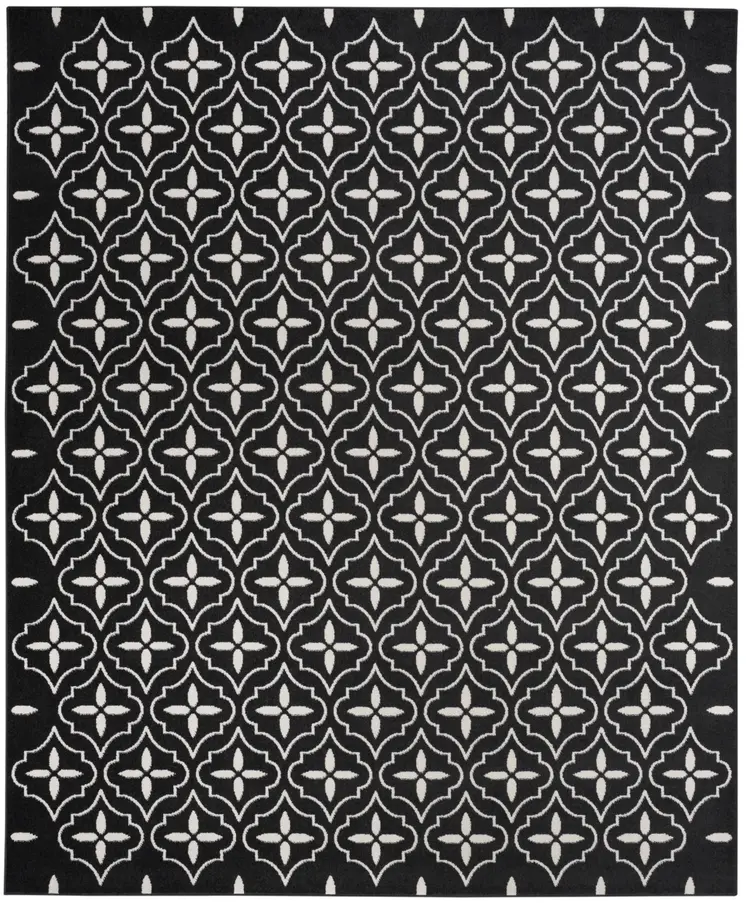 5' X 7' Black And Ivory Geometric Indoor Outdoor Area Rug