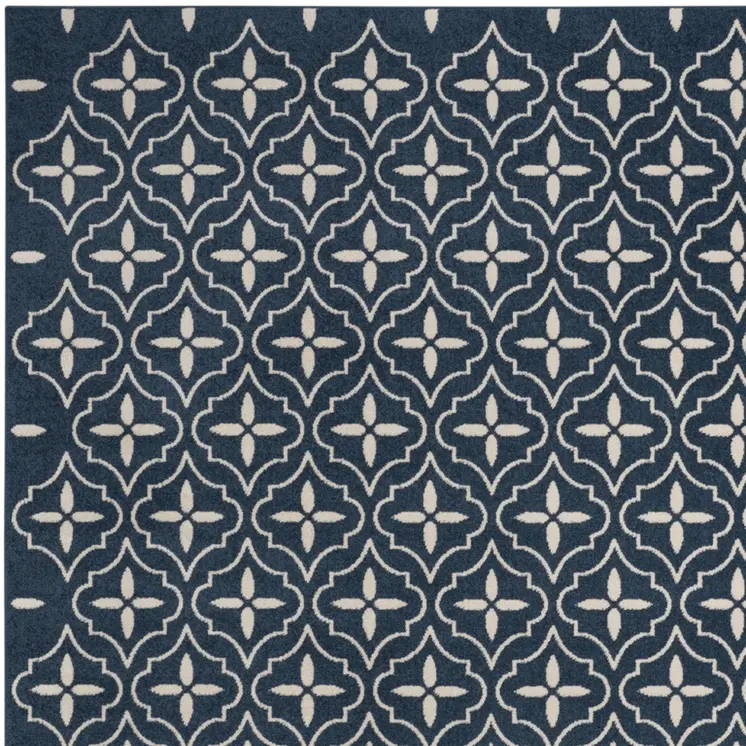 5' X 7' Navy Blue And Ivory Geometric Indoor Outdoor Area Rug