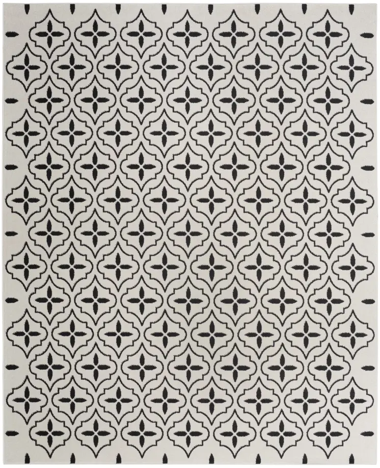 5' X 7' Ivory And Black Geometric Indoor Outdoor Area Rug