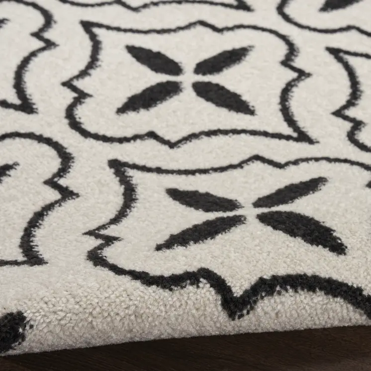 5' X 7' Ivory And Black Geometric Indoor Outdoor Area Rug