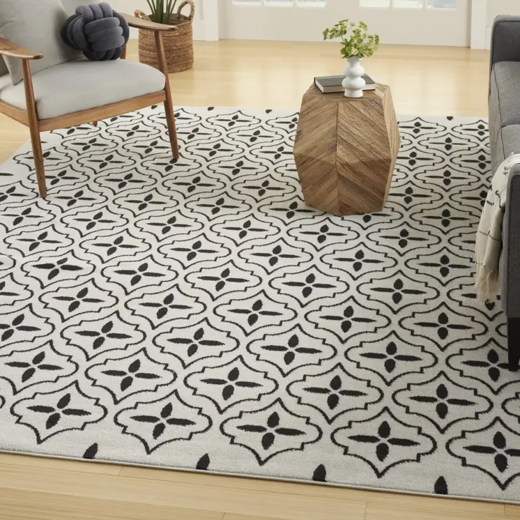 5' X 7' Ivory And Black Geometric Indoor Outdoor Area Rug