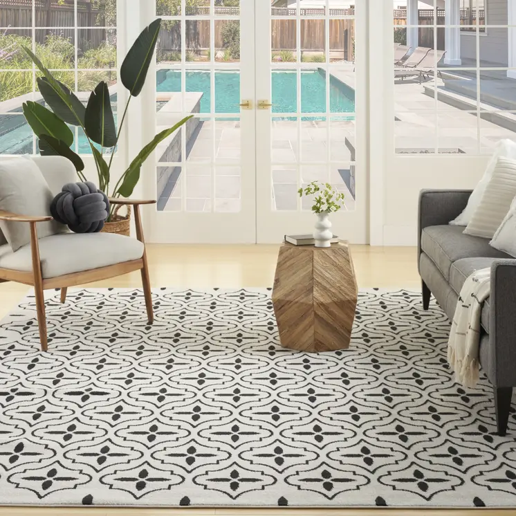 5' X 7' Ivory And Black Geometric Indoor Outdoor Area Rug
