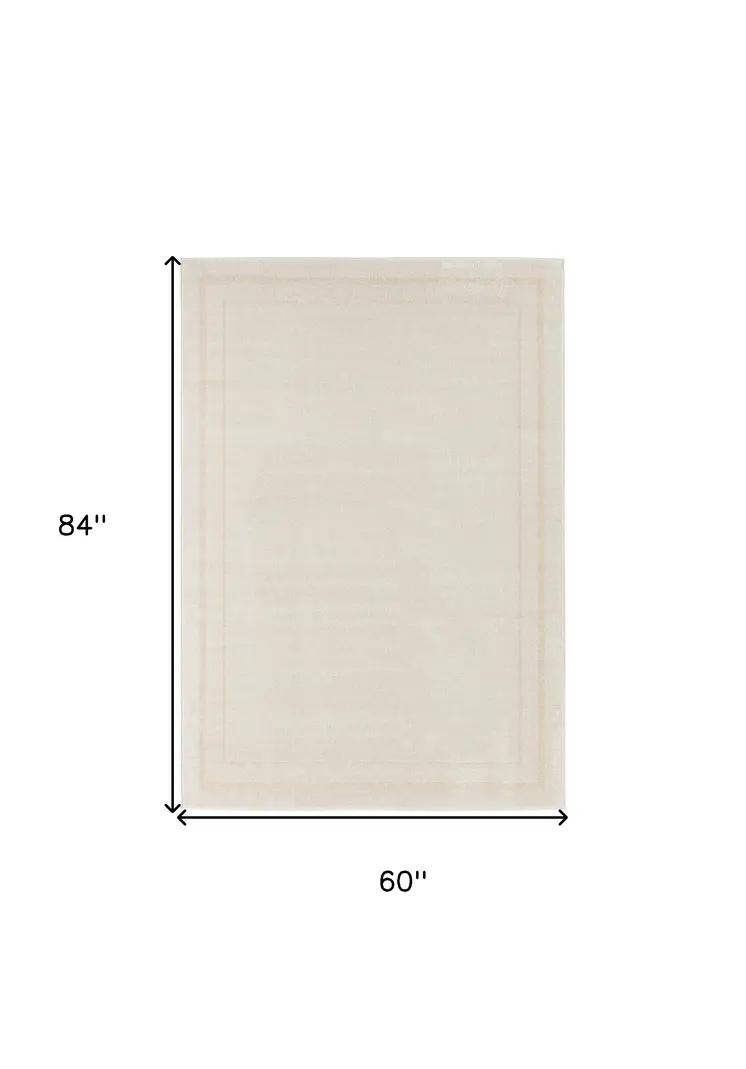 5' X 7' Ivory And Gold Indoor Outdoor Area Rug