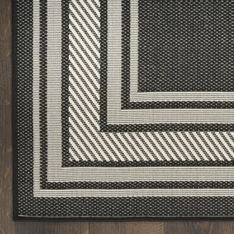 5' X 7' Black Geometric Indoor Outdoor Area Rug