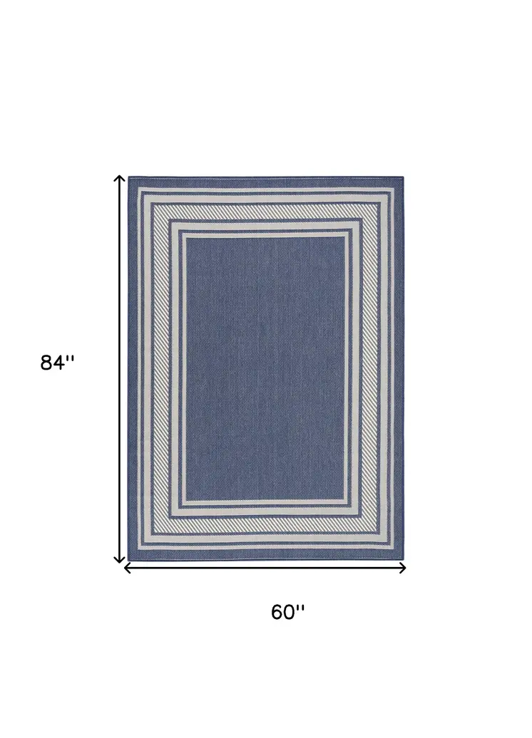 5' X 7' Denim Blue And Ivory Geometric Indoor Outdoor Area Rug