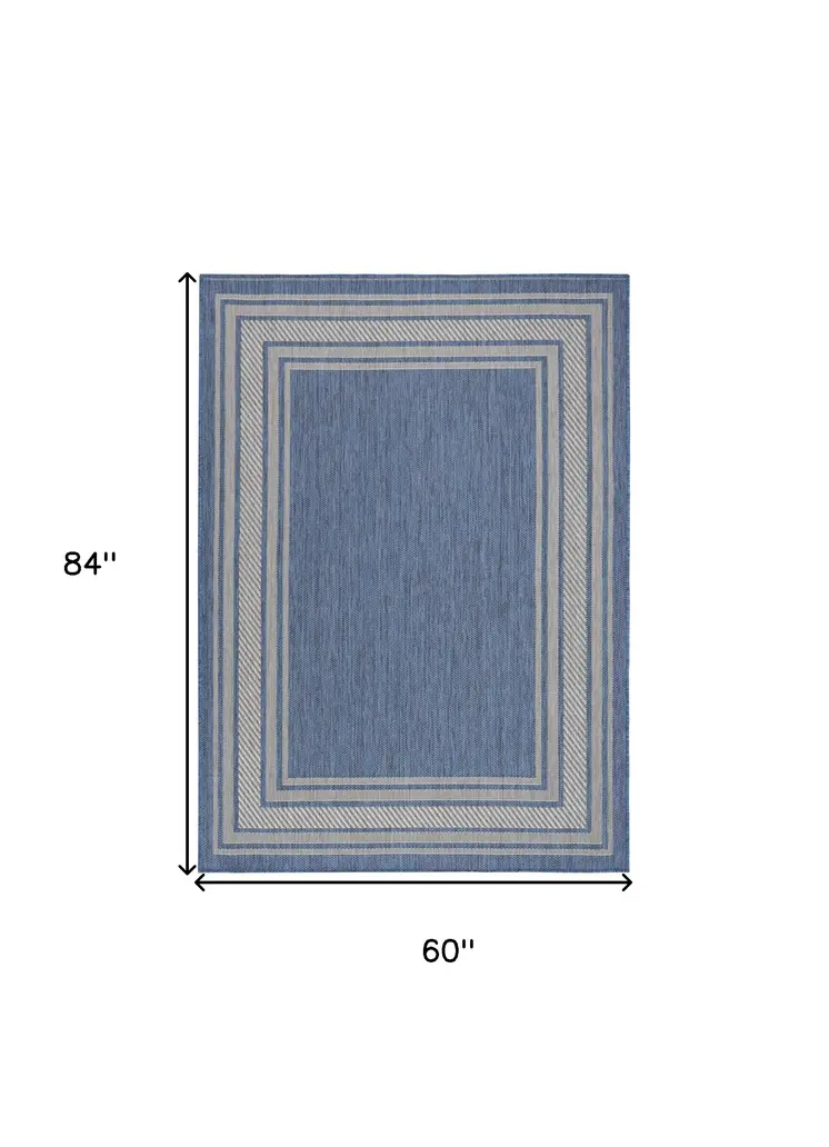 5' X 7' Denim Blue And Ivory Geometric Indoor Outdoor Area Rug