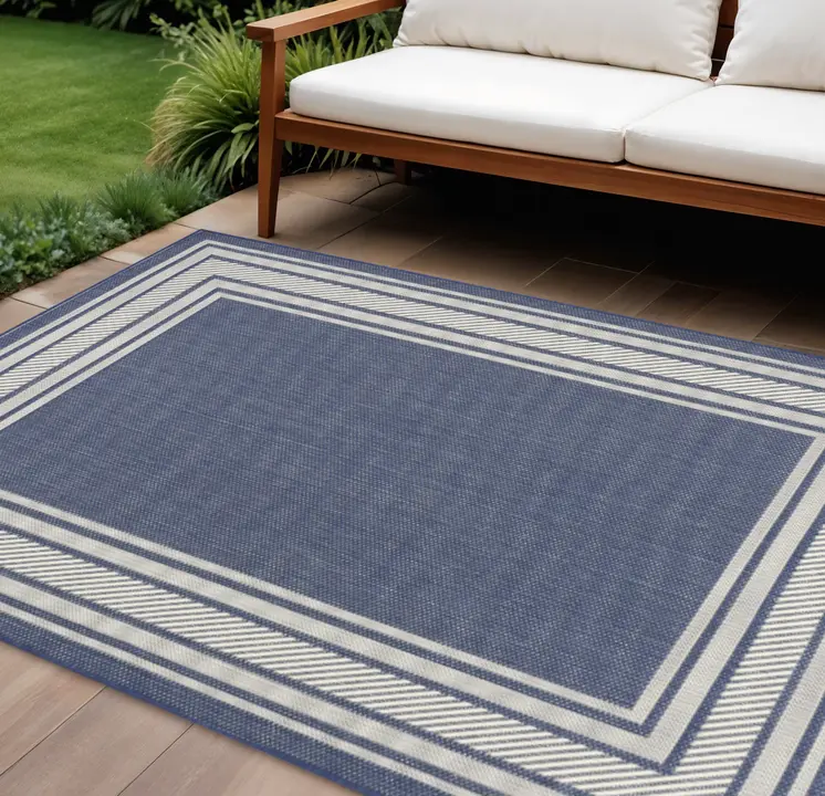 6' X 9' Navy Blue And Ivory Geometric Indoor Outdoor Area Rug