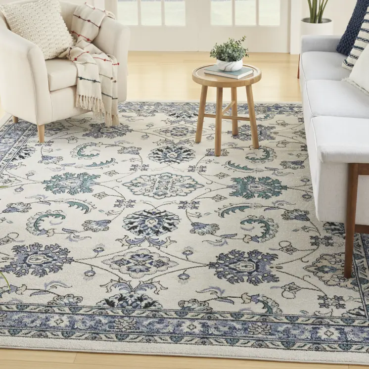 6' X 9' Ivory And Blue Floral Indoor Outdoor Area Rug