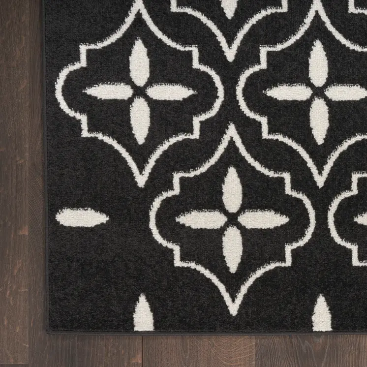 6' X 9' Black And Ivory Geometric Indoor Outdoor Area Rug