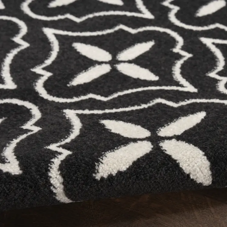 6' X 9' Black And Ivory Geometric Indoor Outdoor Area Rug