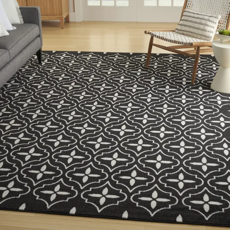 6' X 9' Black And Ivory Geometric Indoor Outdoor Area Rug