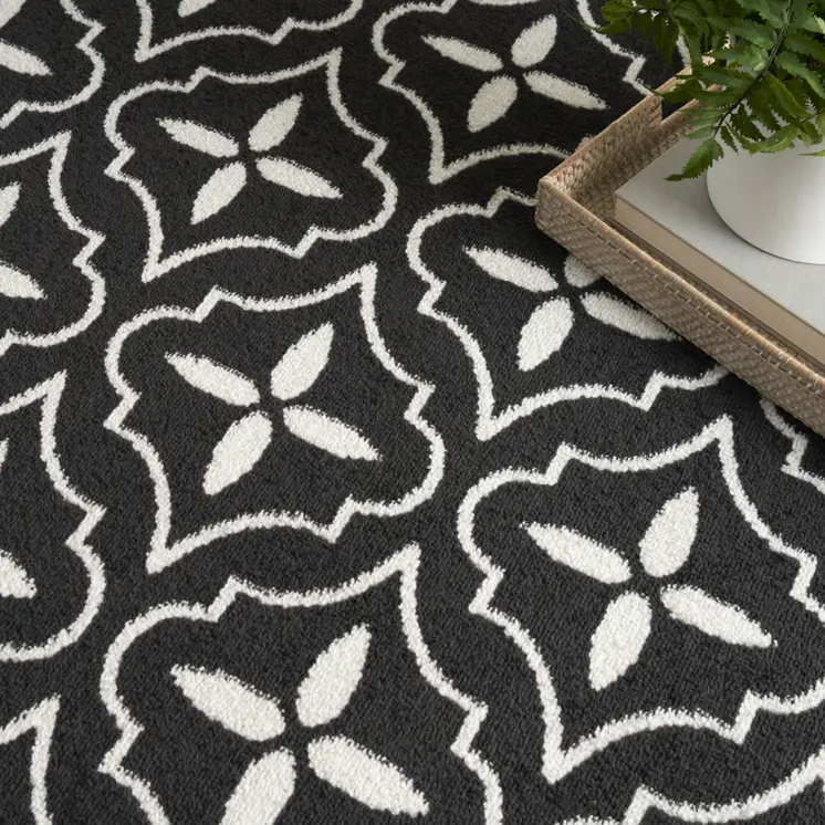 6' X 9' Black And Ivory Geometric Indoor Outdoor Area Rug