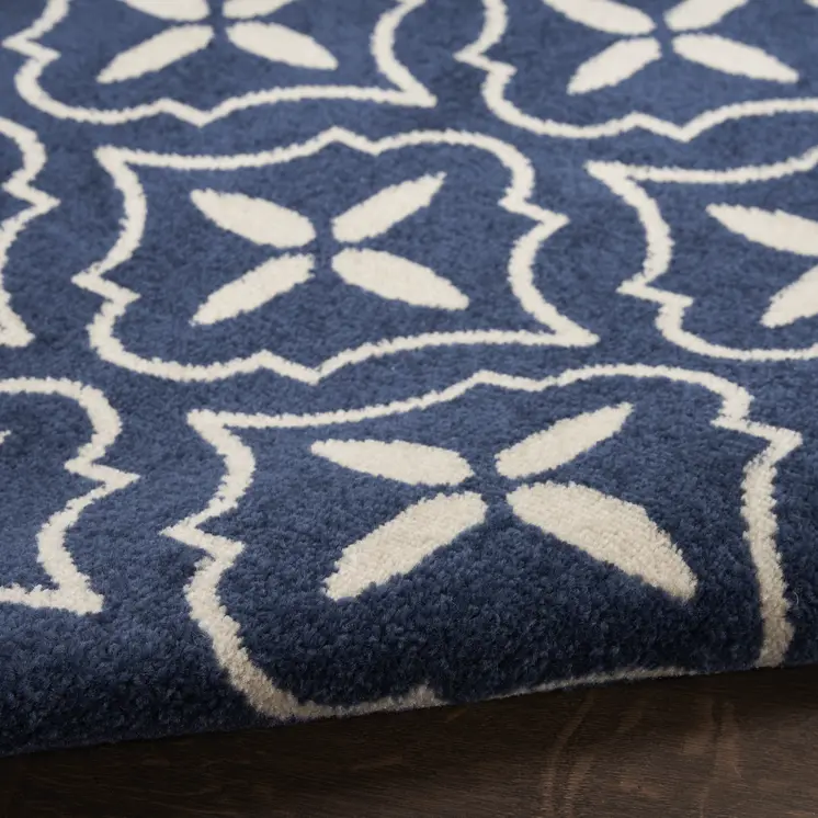 6' X 9' Navy Blue And Ivory Geometric Indoor Outdoor Area Rug