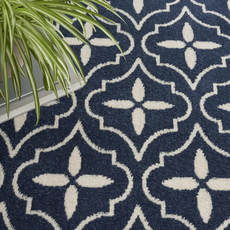 6' X 9' Navy Blue And Ivory Geometric Indoor Outdoor Area Rug