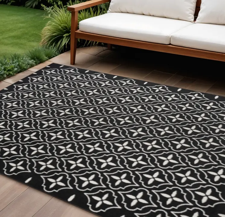 8' X 10' Black And Ivory Geometric Indoor Outdoor Area Rug