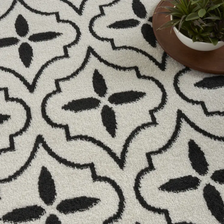 8' X 10' Ivory And Black Geometric Indoor Outdoor Area Rug