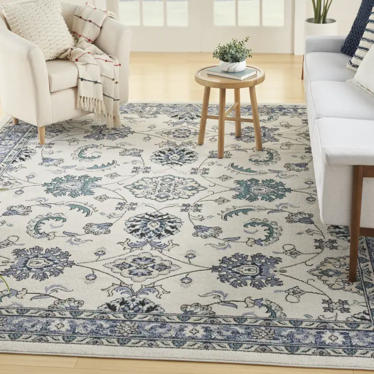 9' X 12' Ivory And Blue Floral Indoor Outdoor Area Rug