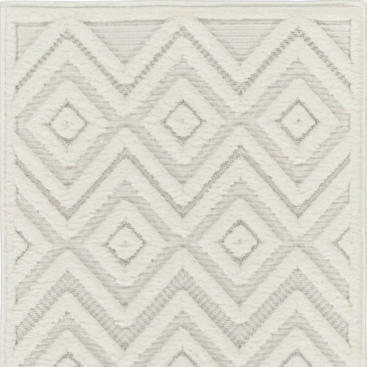 2' X 4' Ivory And White Geometric Indoor Outdoor Area Rug