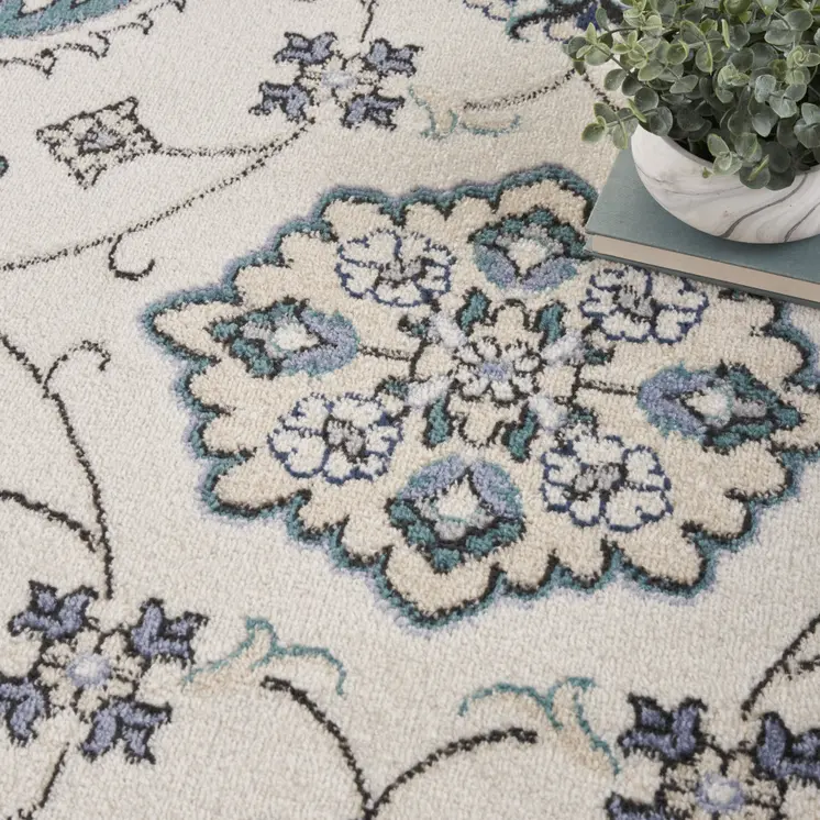 4' Ivory And Blue Round Floral Indoor Outdoor Area Rug