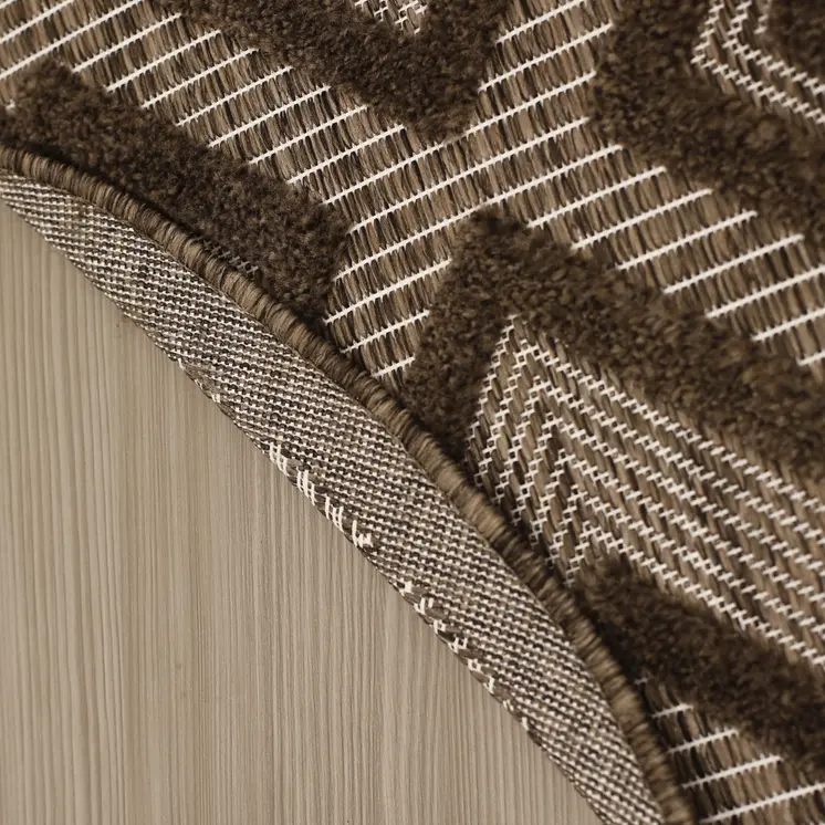 4' Dark Brown And Light Brown Round Geometric Indoor Outdoor Area Rug