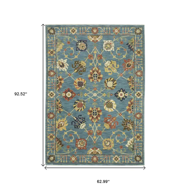 5' X 8' Blue Yellow And Ivory Oriental Area Rug With Fringe