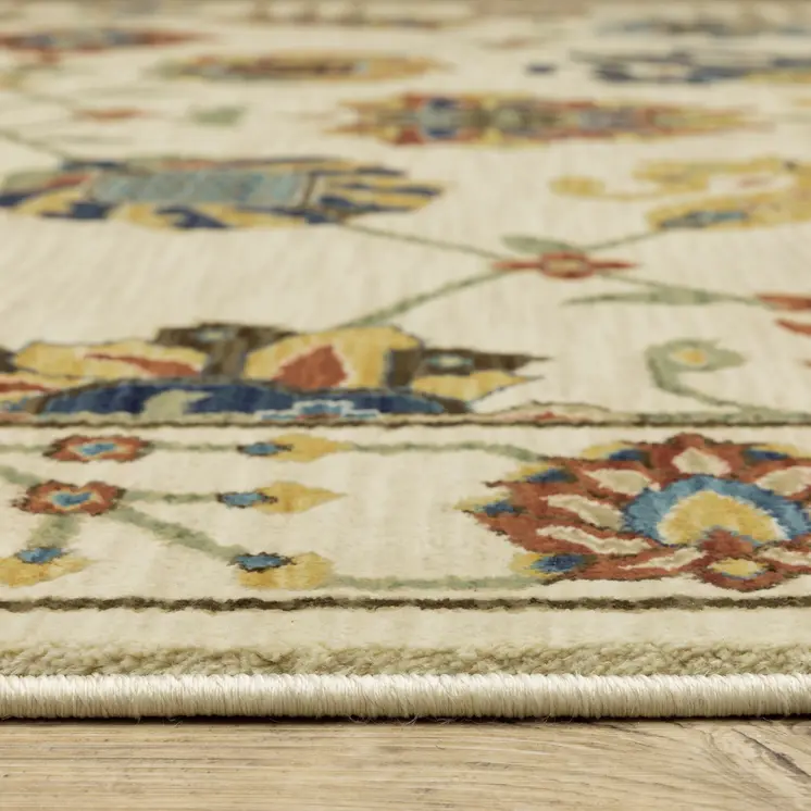 5' X 8' Ivory Yellow And Orange Oriental Area Rug With Fringe