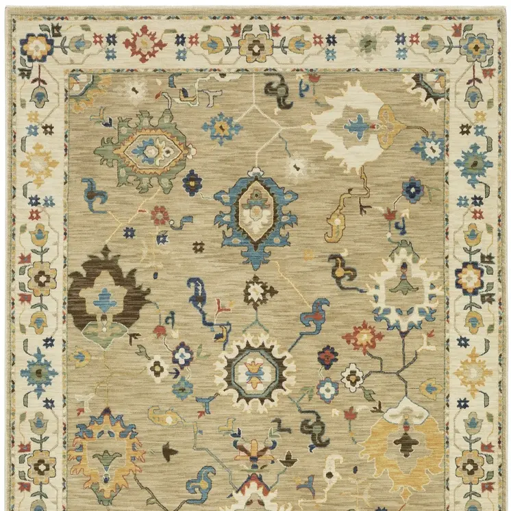 7' X 10' Beige Light Blue And Tan Oriental Area Rug With Fringe