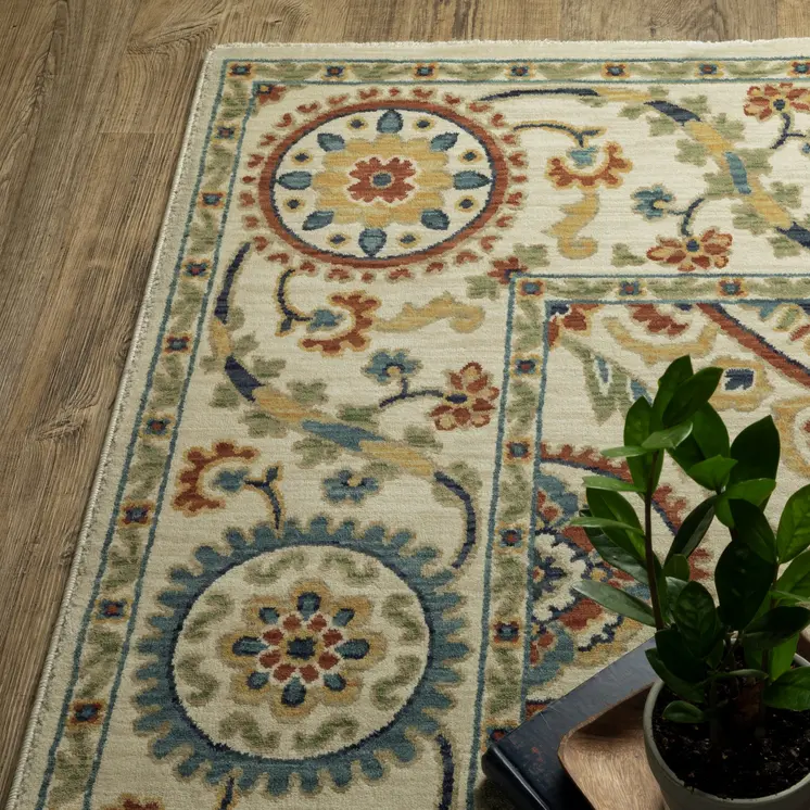 8' X 11' Ivory Blue And Orange Oriental Area Rug With Fringe