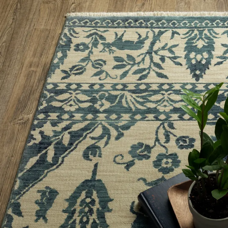 5' X 8' Ivory And Blue Oriental Area Rug With Fringe