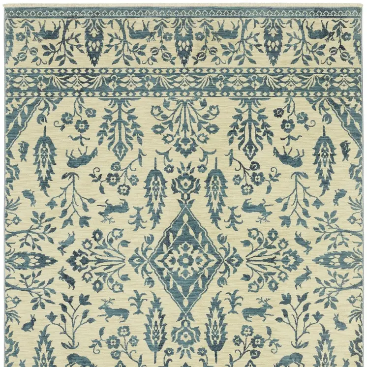 7' X 10' Ivory And Blue Oriental Area Rug With Fringe