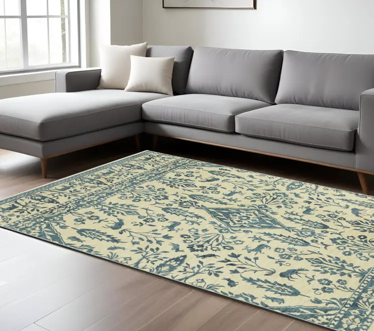 7' X 10' Ivory And Blue Oriental Area Rug With Fringe