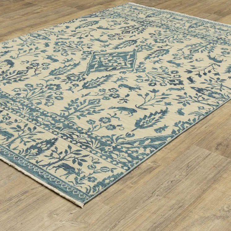 7' X 10' Ivory And Blue Oriental Area Rug With Fringe