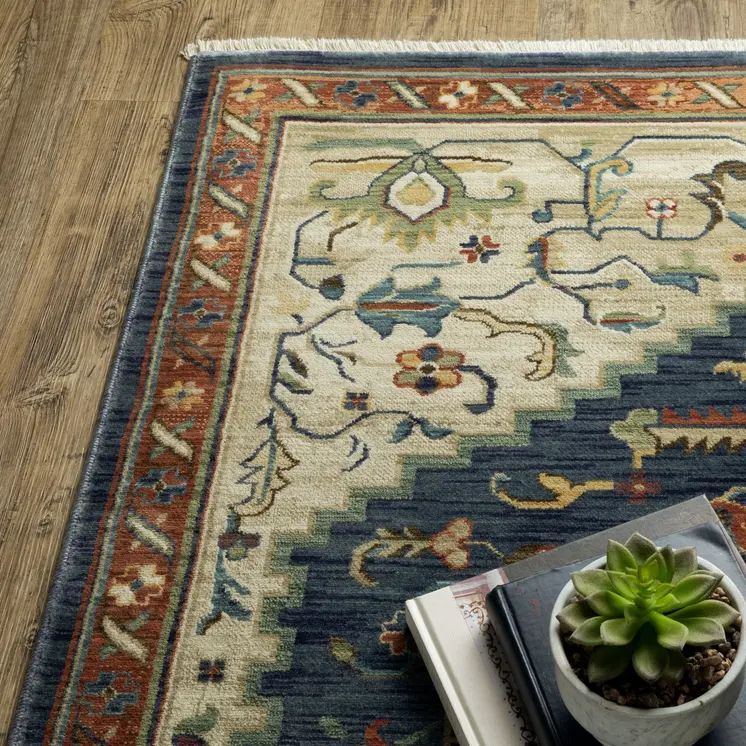 5' X 8' Blue Ivory And Orange Oriental Area Rug With Fringe
