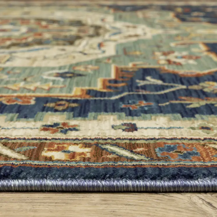 5' X 8' Blue Ivory And Orange Oriental Area Rug With Fringe