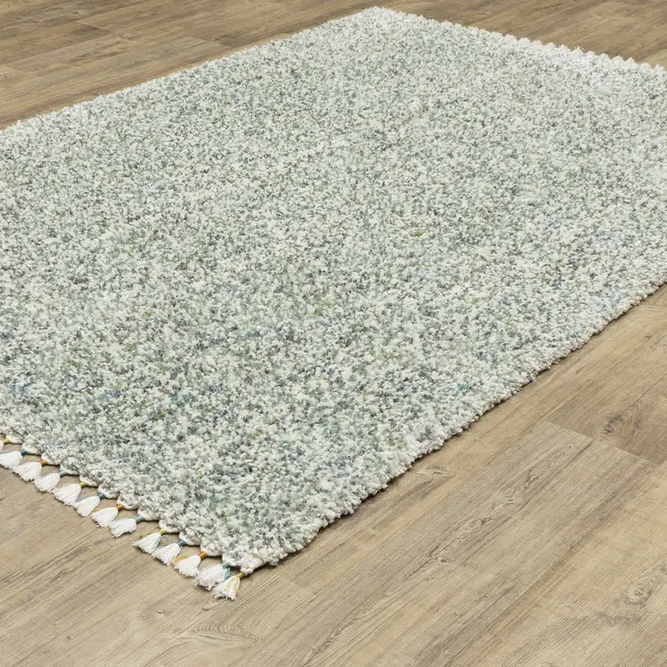 4' X 5' Light Blue And Ivory Abstract Shag Area Rug With Fringe