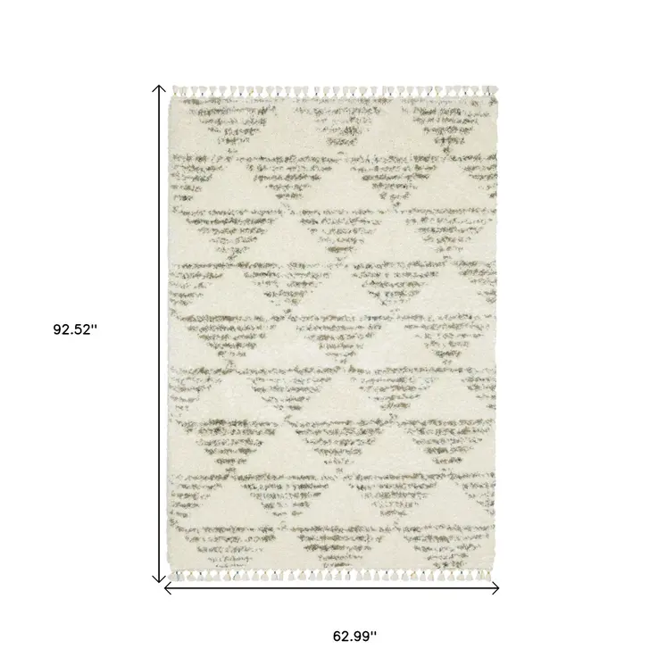 5' X 8' Ivory And Green Geometric Shag Area Rug With Fringe